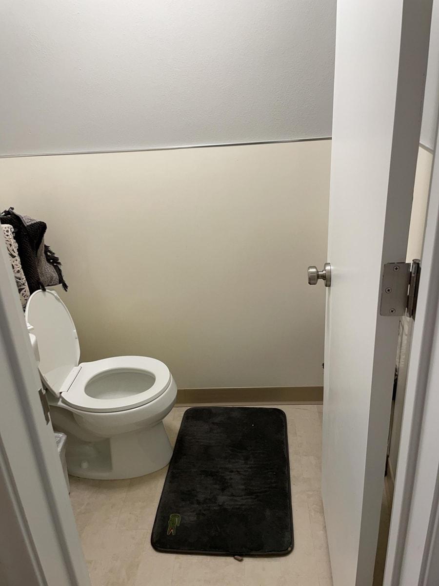 Sewer Backup Restoration in a Basement Bathroom & Laundry