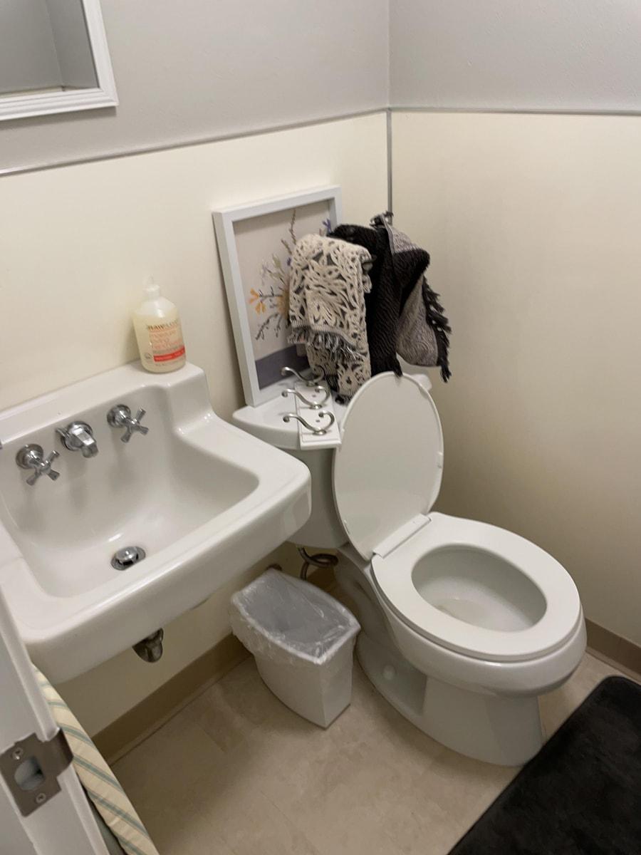 Sewer Backup Restoration in a Basement Bathroom & Laundry