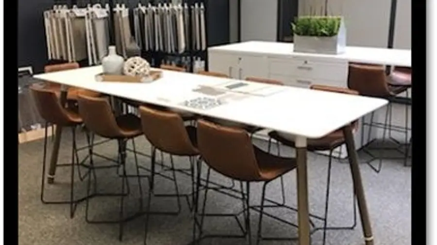The Ungerman selection showroom, with a consultation table and racks of finish samples