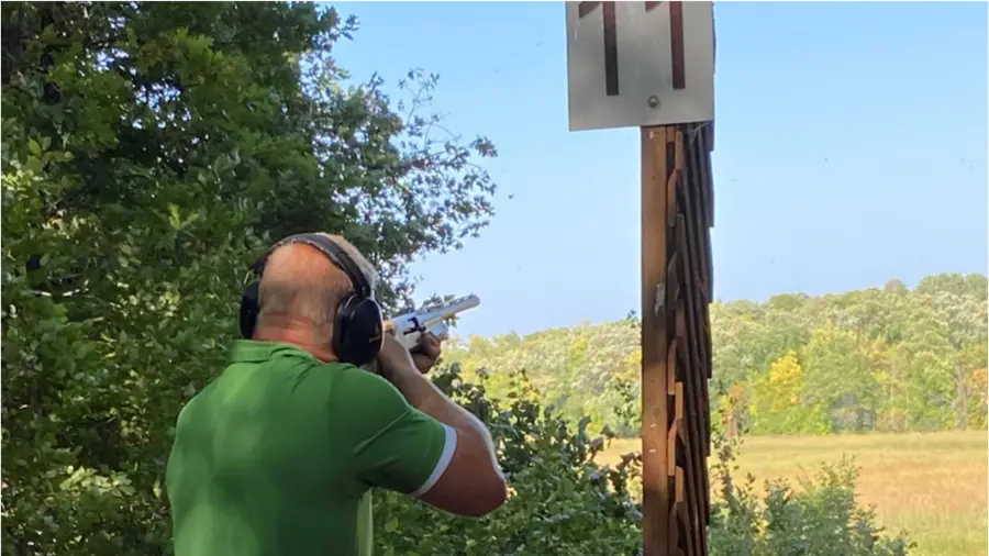 A participant shooting sporting clays at the MNCAR outing