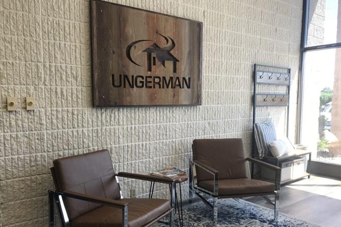 The Ungerman lobby with branded wall signage and seating.