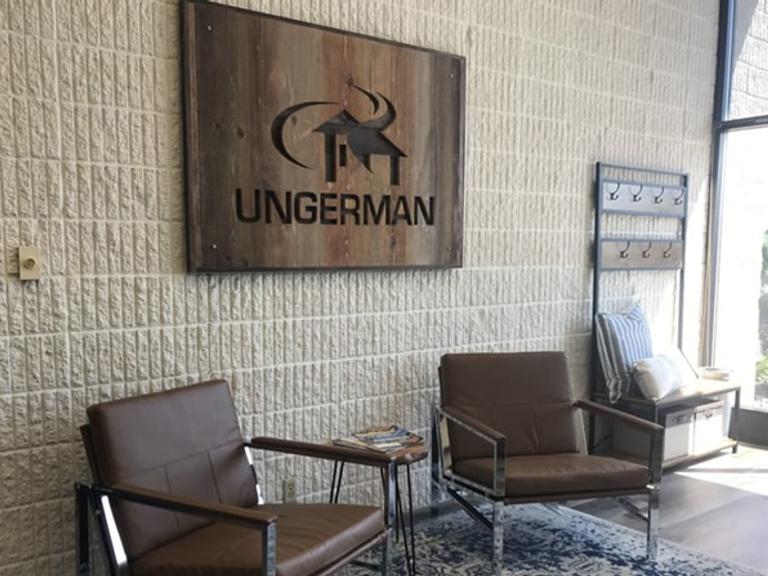 The Ungerman lobby with branded wall signage and seating.