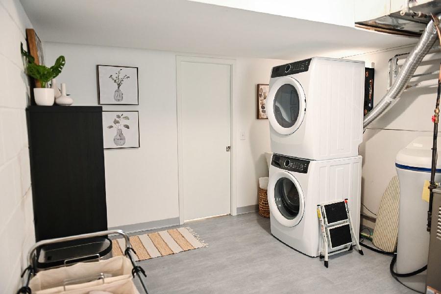 Sewer Backup Restoration in a Basement Bathroom & Laundry