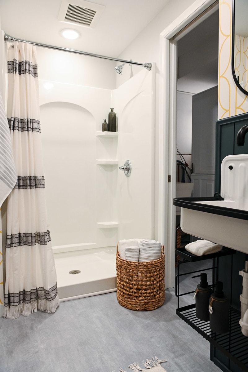 Sewer Backup Restoration in a Basement Bathroom & Laundry