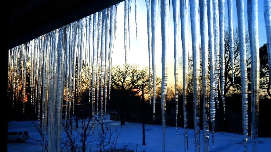 Picture of icicles on a roof during a Minnesota winter.